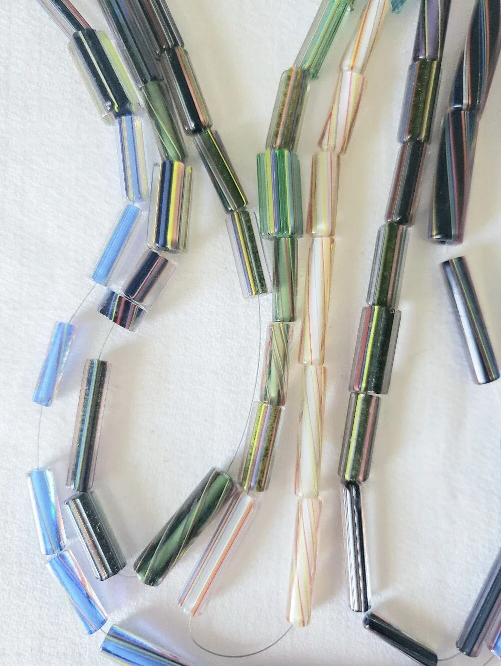 80 hand-drawn glass tube beads